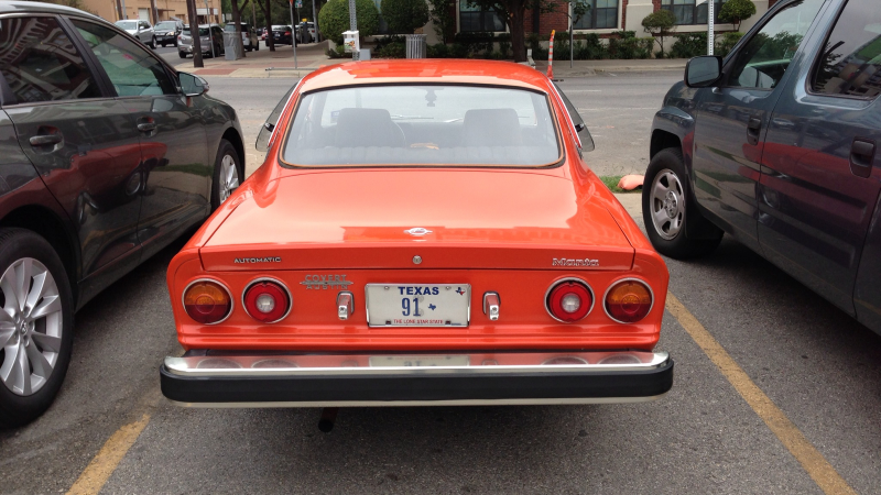 Illustration for article titled This Opel Manta Is A Bolt Of Orange Lightning